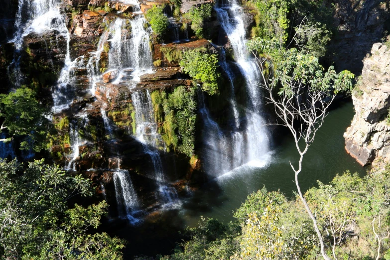 some very tall water falls in a large area