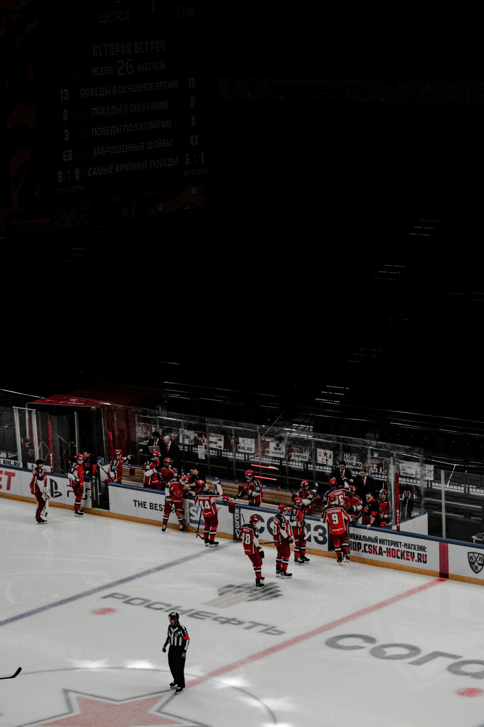 a hockey team is playing in an arena