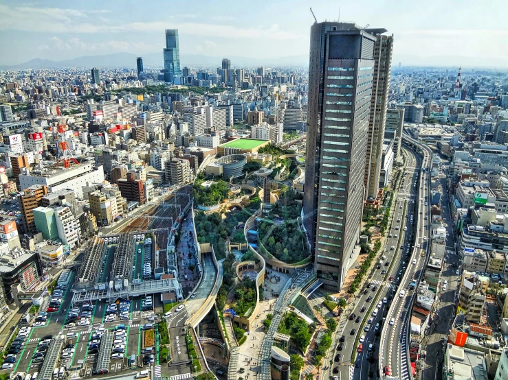 an aerial view of the city with lots of tall buildings