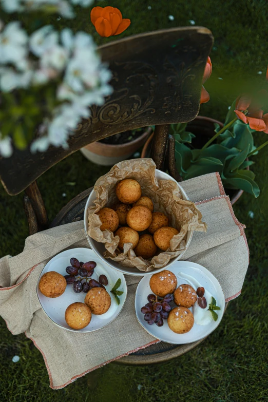 a table has some breaded items on plates