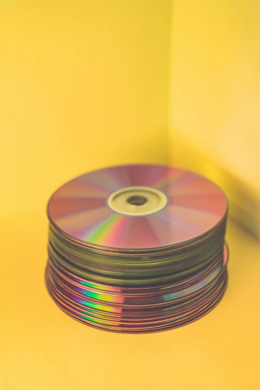a stack of cds sits in a corner