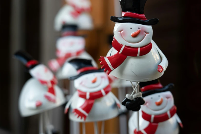 a group of snowmen standing next to each other