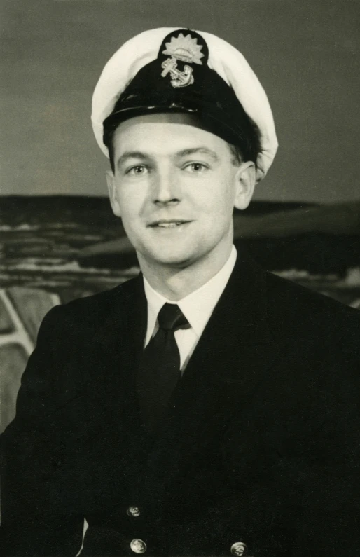 an old po of a man in a naval dress