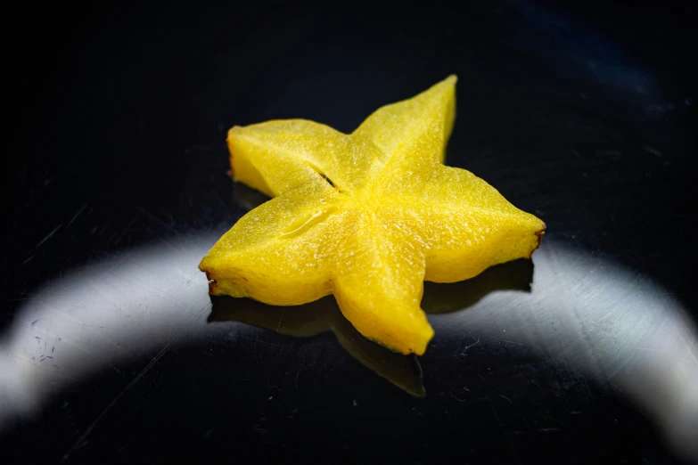 an image of fruit on the black surface