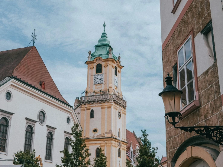 a clock that is on the side of a tower