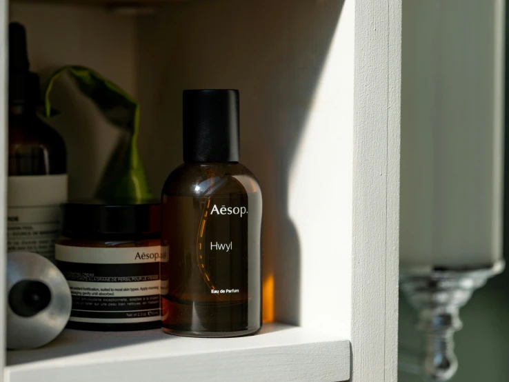 two bottles of essentials are on the shelf