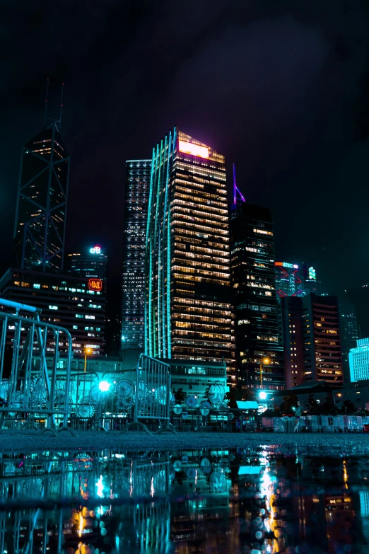 the buildings in this city are reflected in the water