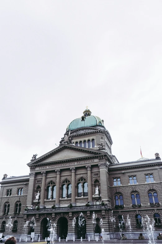 a large building with two domes on top