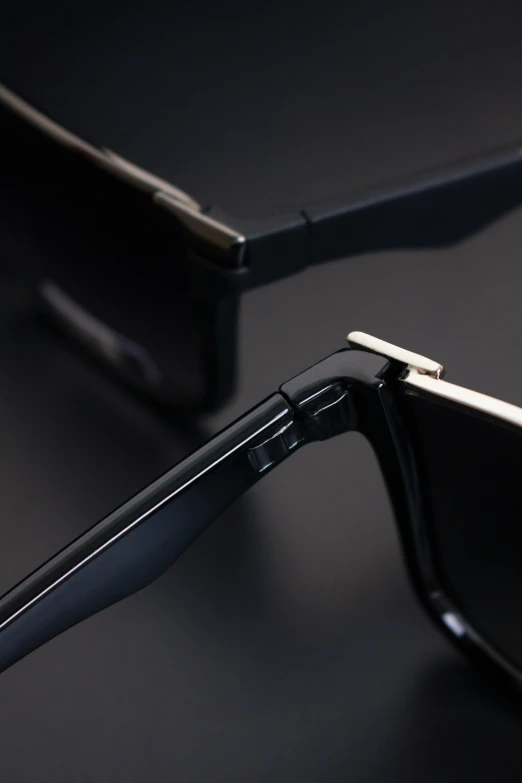 a close up of a pair of black glasses