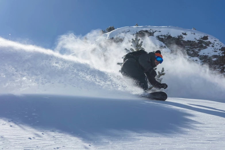 a man on a snowboard in the snow