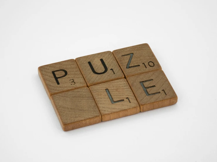 four wooden blocks with different words arranged in them