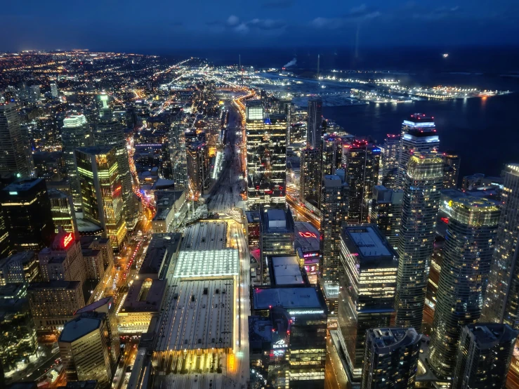 an aerial view of a city with skyscrs