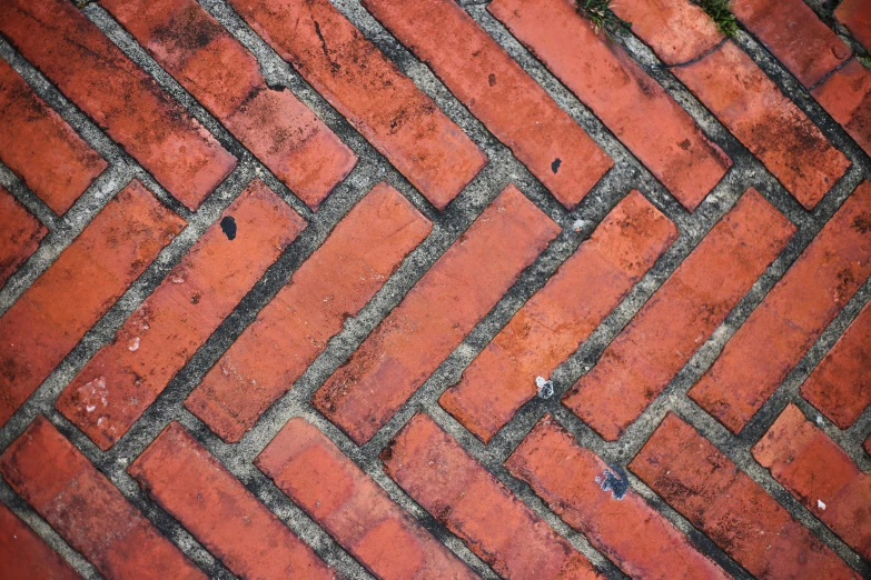 a picture of bricks that are red on the ground