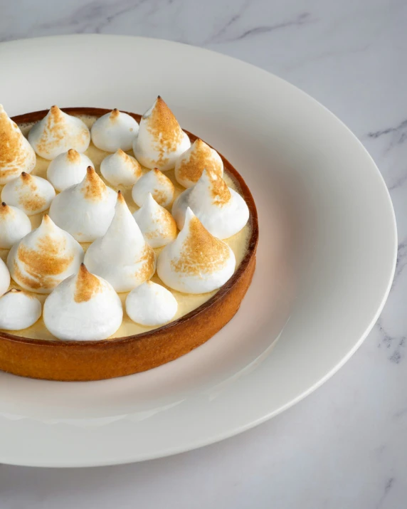 an entree with marshmallows sitting on a plate