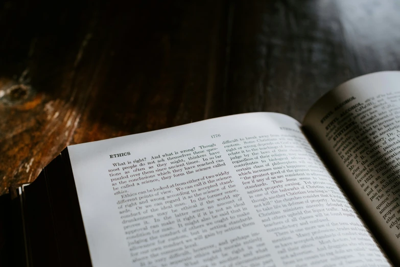 a book sitting on a table with its pages open