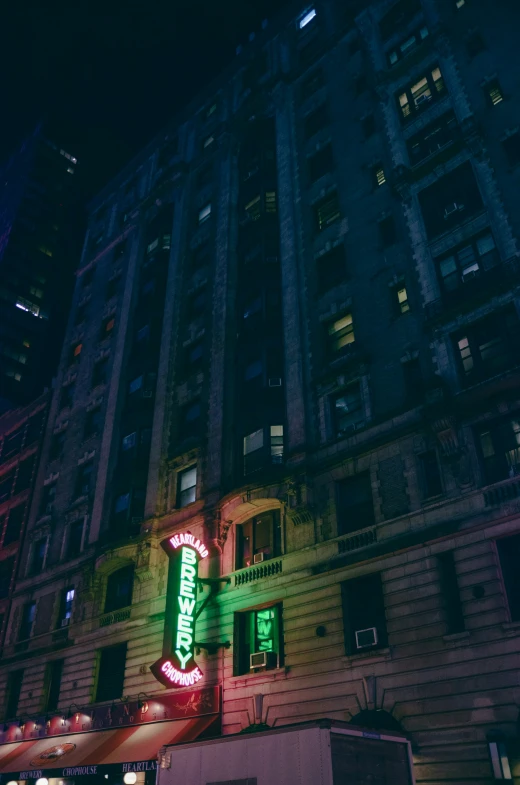 a big building that has neon signs in it