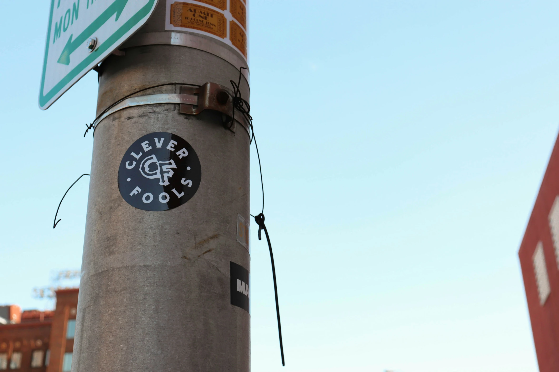 the top of the sign has a black and white logo