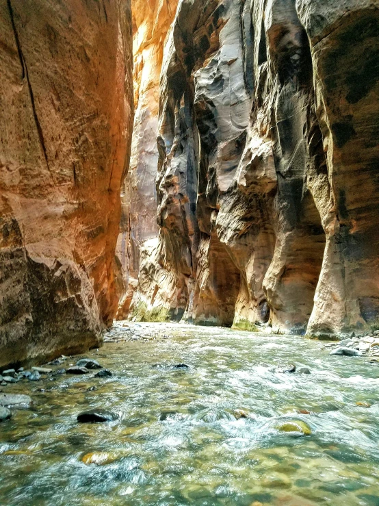 a person riding on a boat through the narrows