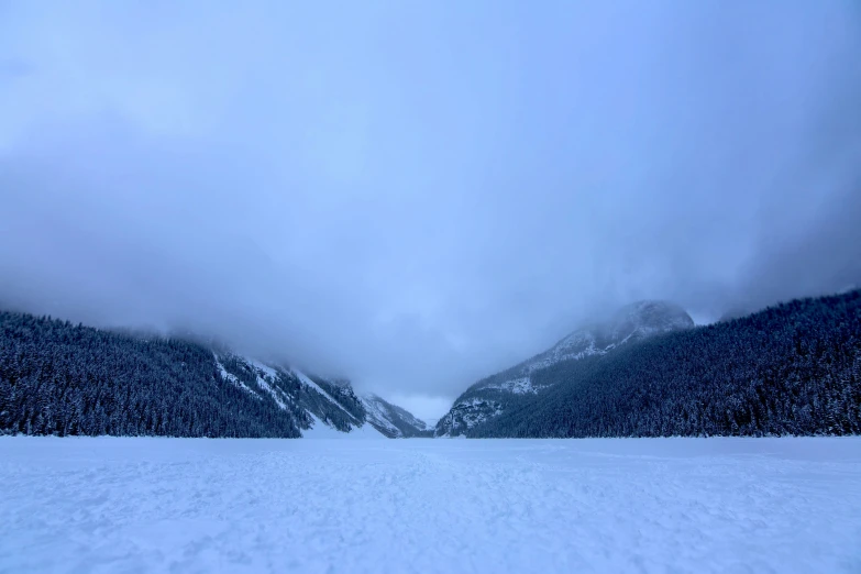 a man is skiing on a snowy mountain