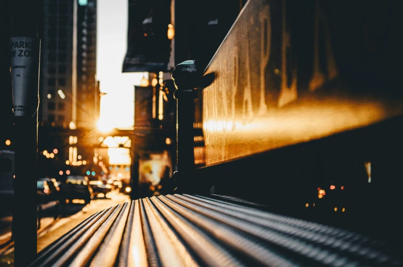 street scene with car and train on tracks