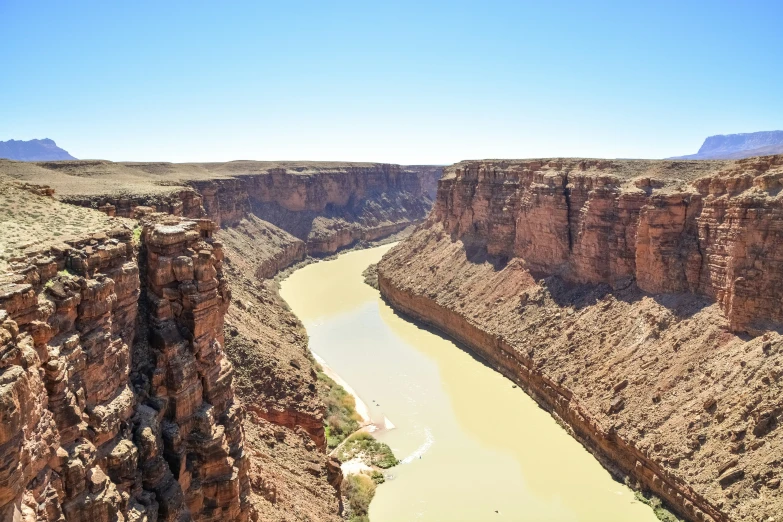 the view of a river running through a canyon