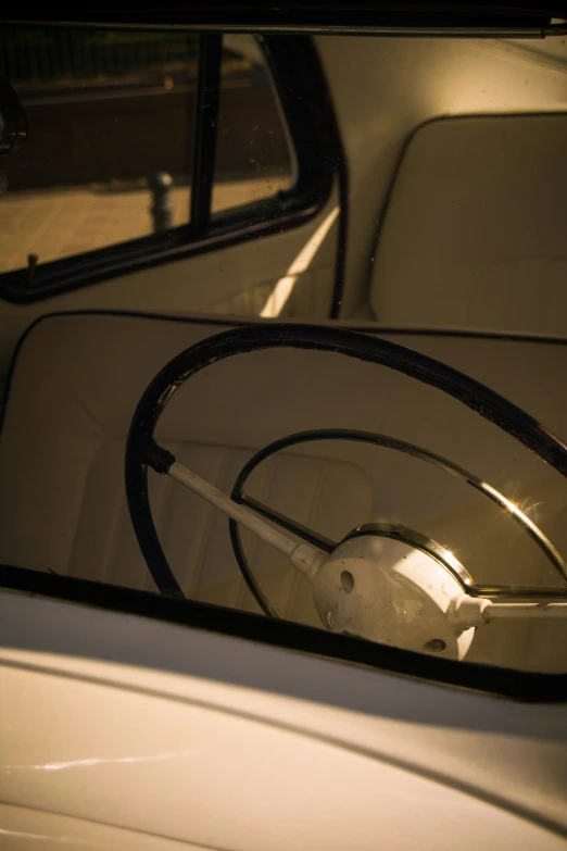 a side mirror of a car parked in a parking lot