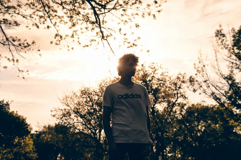 a man is standing with his back to the camera