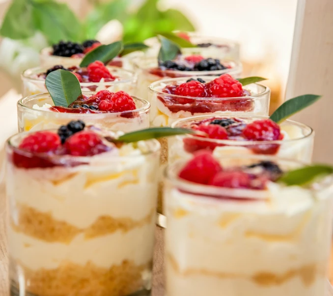 small desert of cheesecake with fruit in them