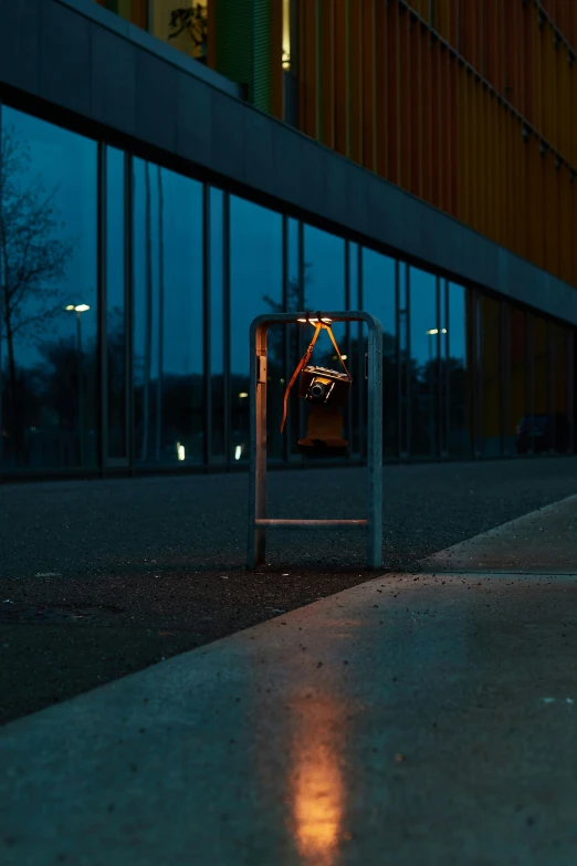 the building is lit up by street lights