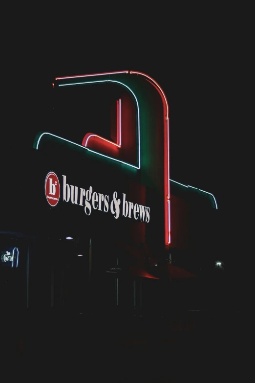 the burgers and browns sign lit up in red, blue, and green