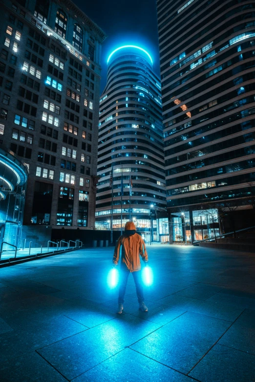 a person walks down the city street with their lights on