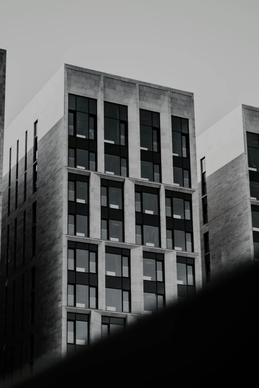 several windows and side of a large building