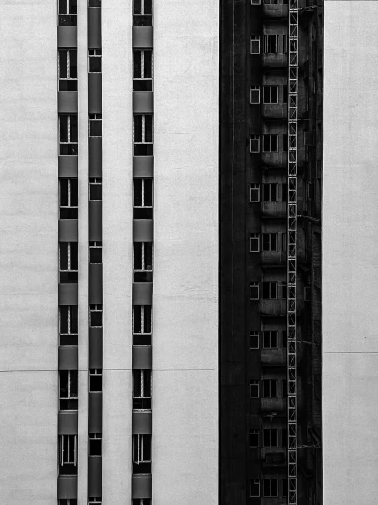 four large tall building that are black and white