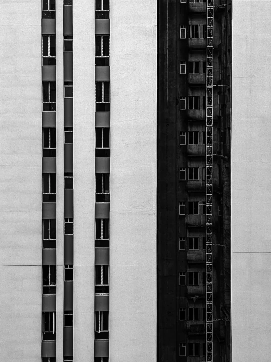 four large tall building that are black and white