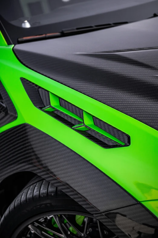 the rear bumper of a neon green jeep