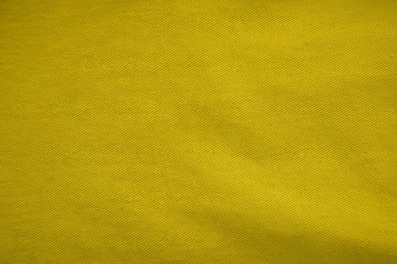 an empty yellow canvas with very soft folds