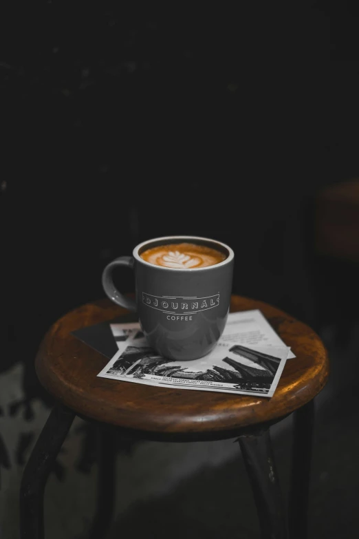 an almost empty coffee cup on a small table