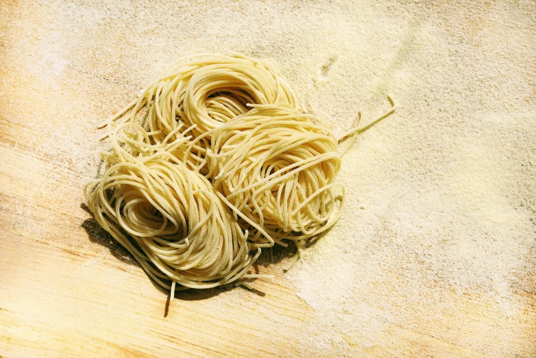 two small round noodles laying on the ground