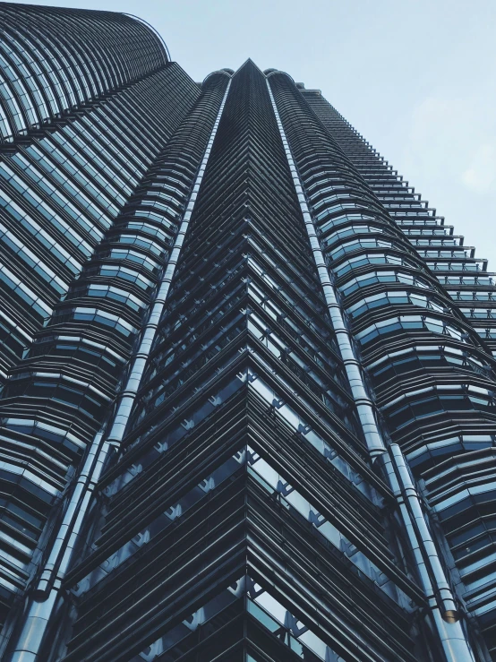 a tall building with multiple stories built into the side of it