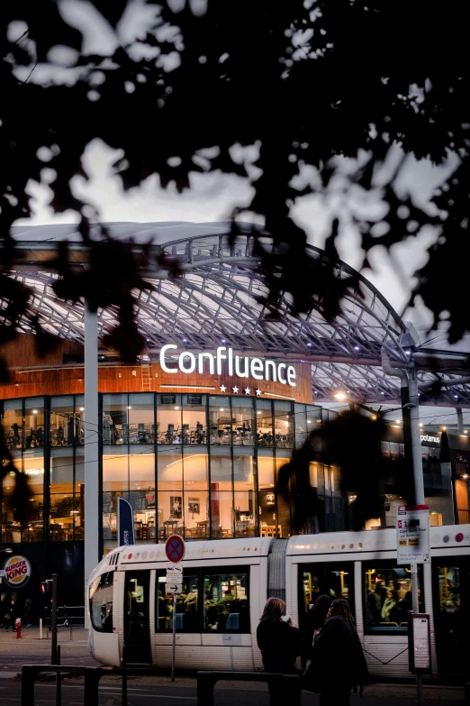 a train parked at the entrance to a convention