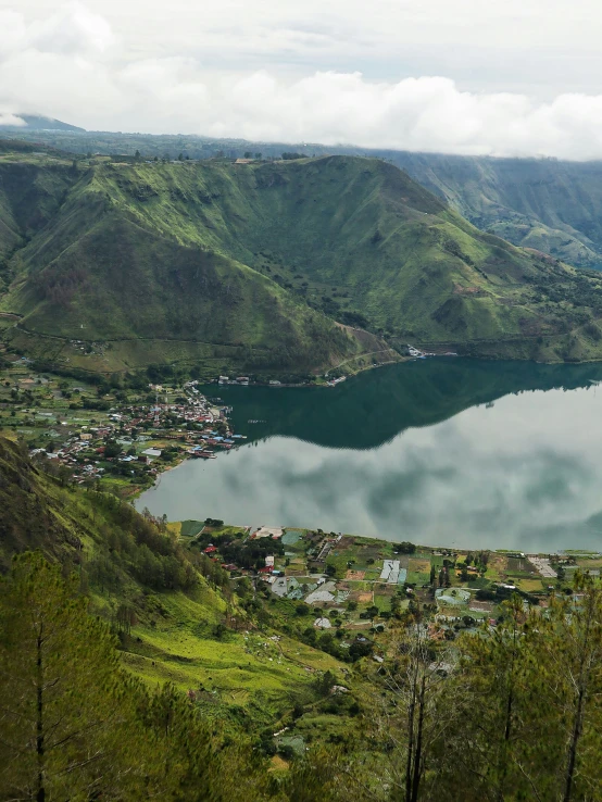 a view over a mountain valley and lake