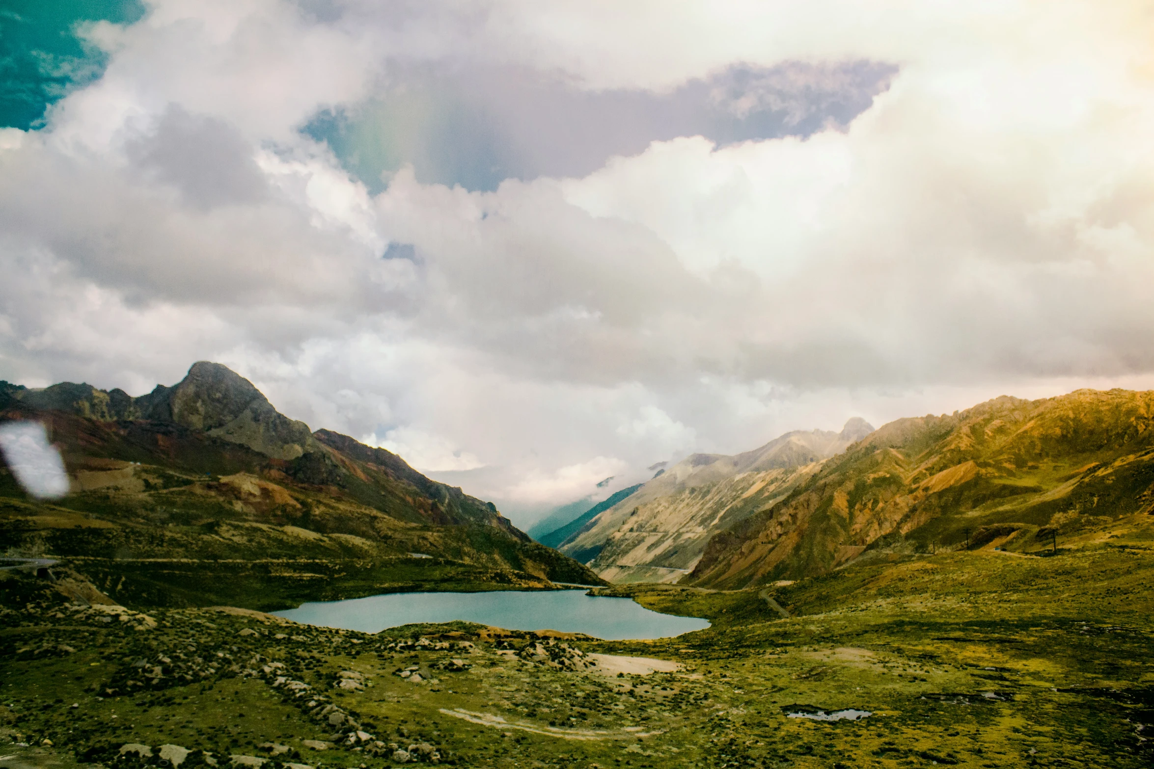 a view of some very beautiful mountains and lakes