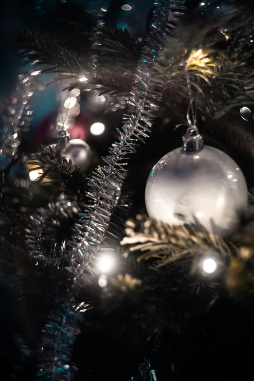 a close - up view of the decorations on the christmas tree