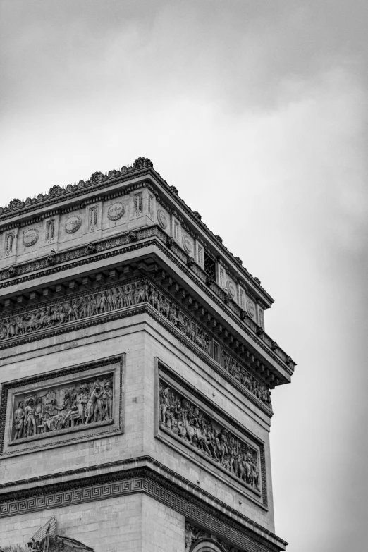 a black and white po of the top of a tower