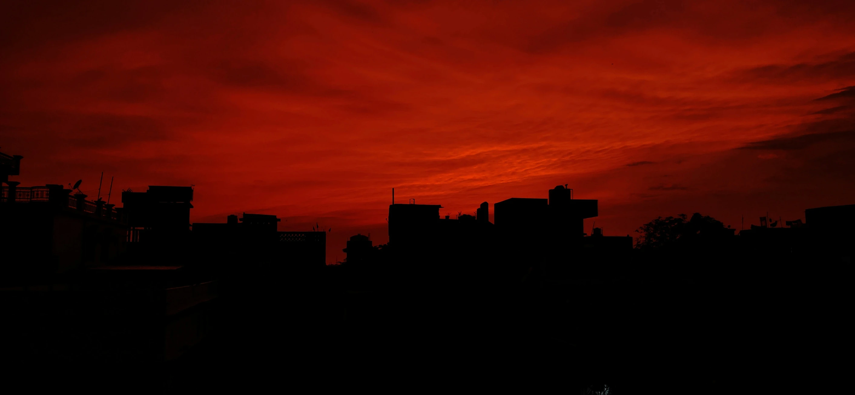 a view of a skyline that has buildings at the bottom of it