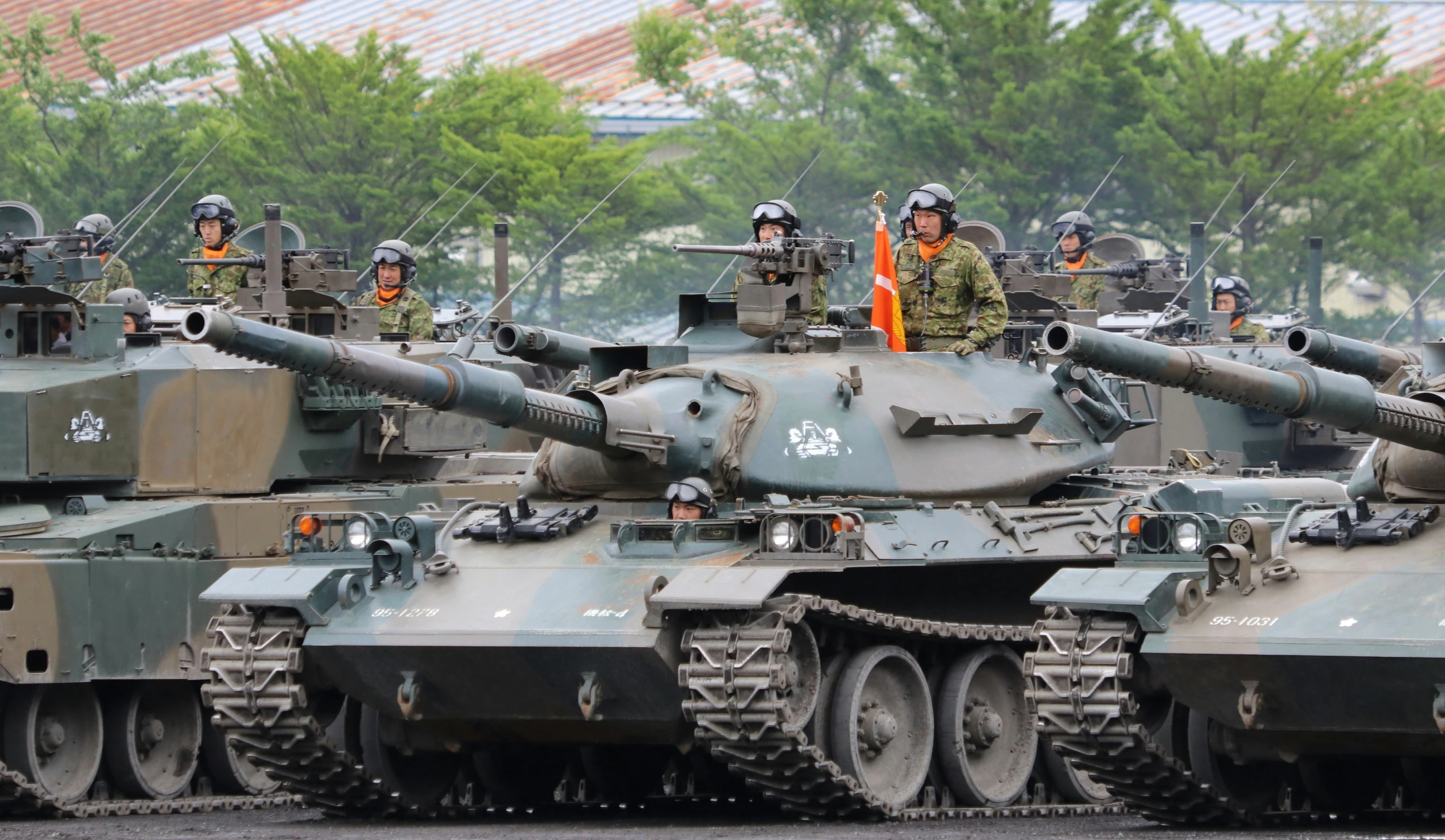 tank tanks are lined up in the street