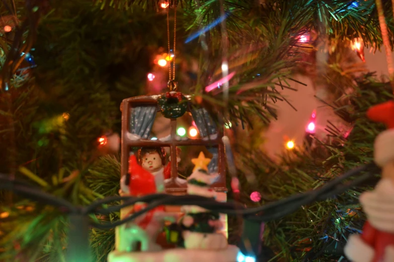 a christmas tree filled with ornaments and lights