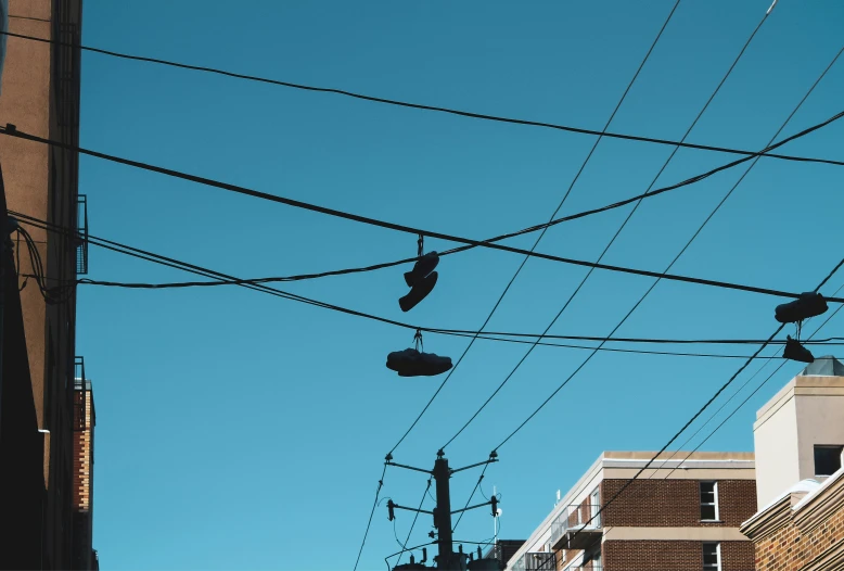 power lines and buildings and blue sky