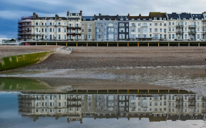 several beachfront apartments with two of them lined up against the shore line