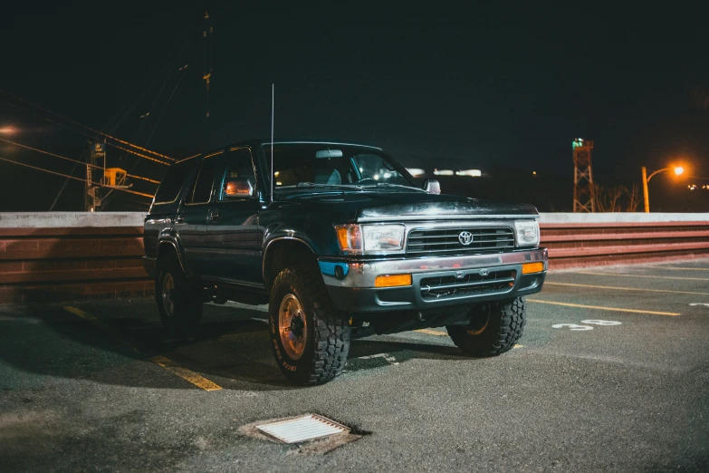 a truck parked in front of a ramp and road